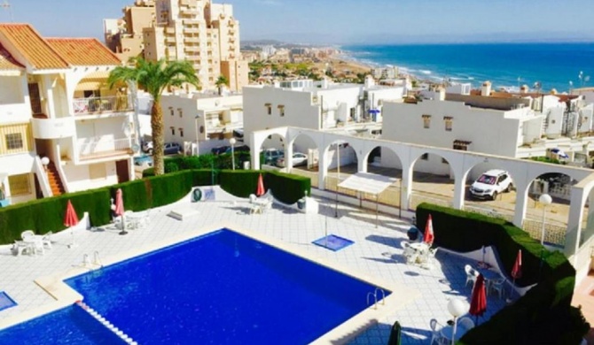 Apartment with pool, sea views & balcony less than 10min walk to La Mata Beach!